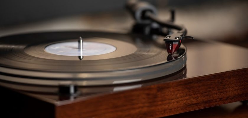 What is the Auto Stop feature in a turntable