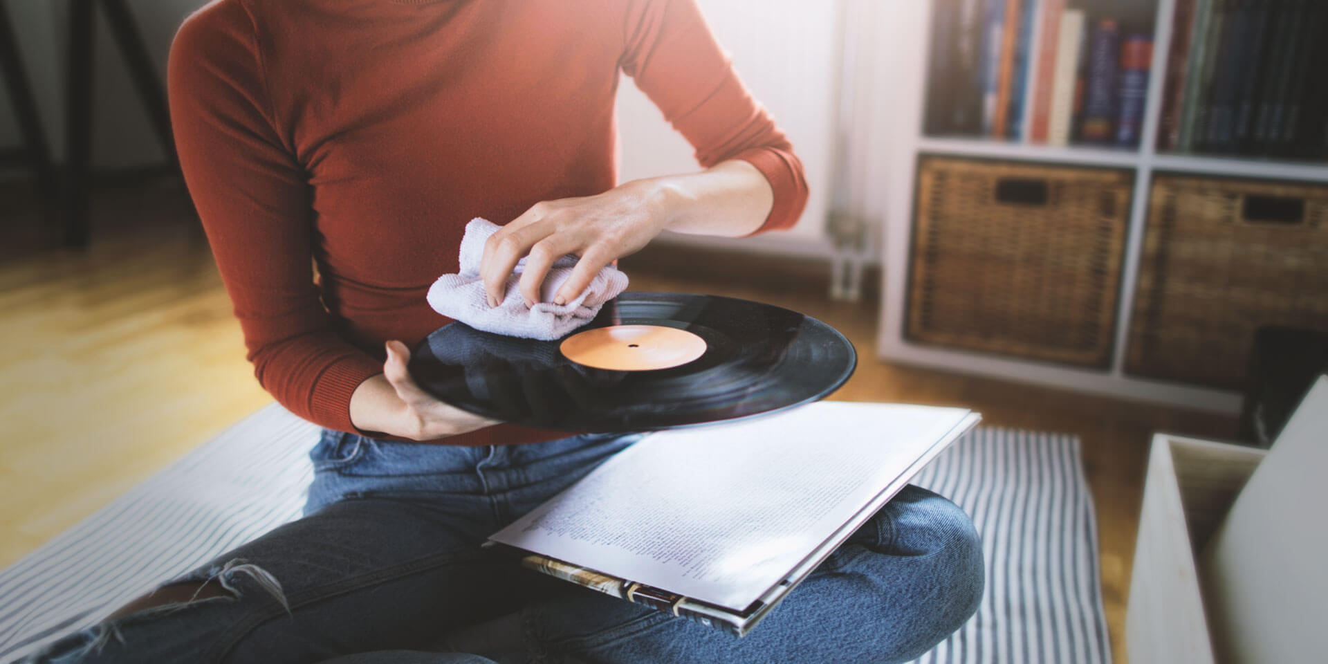 Can I clean vinyl records with soap and water?